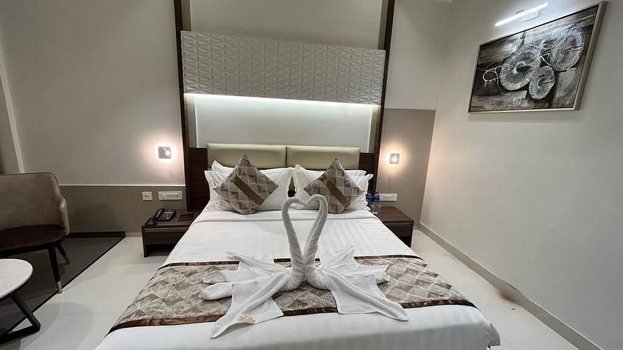 A front view of a bed with bedding