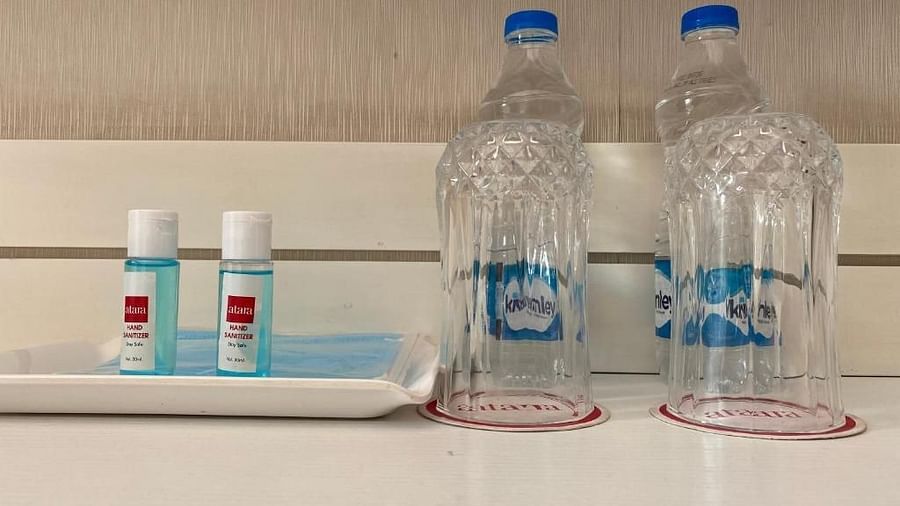 Water bottle with sanitizer