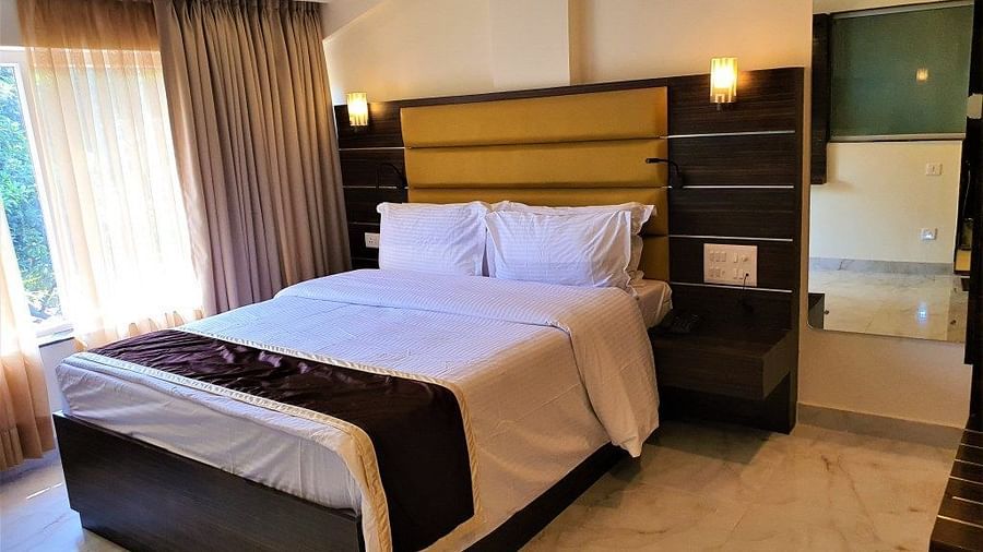 a double bed inside the deluxe room at VITS shanti solitaire, North Goa