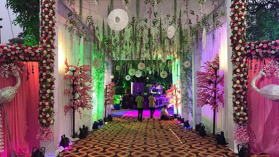 an entrance to a hall decorated for an event - Zara's Resort 1