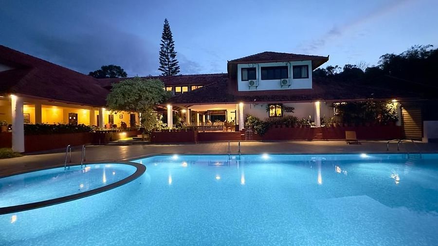 outdoor swimming pool at Kadkani River Resort, Coorg