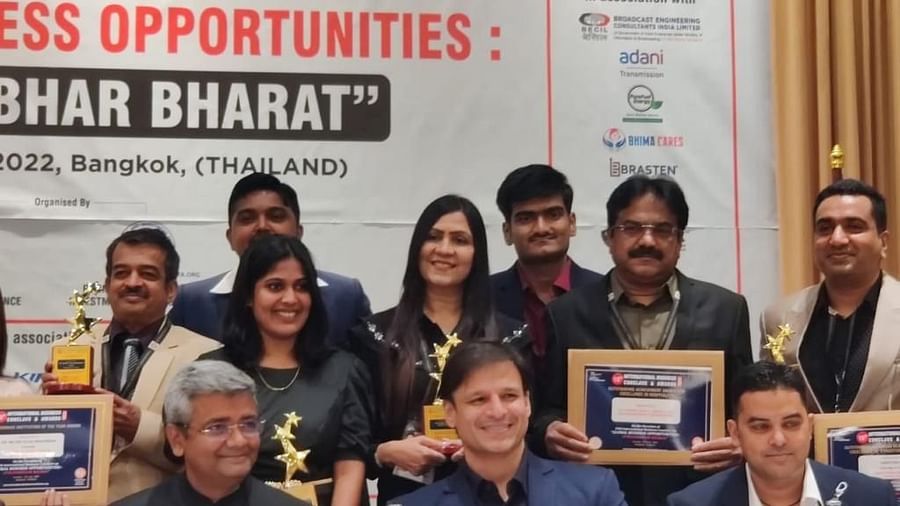 Image of member of the resort in an award function. 