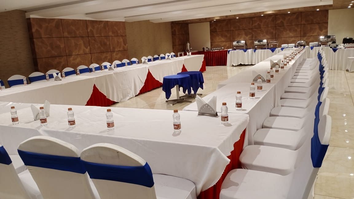 Terminal 01 Hall at Wonder Country Club and Resort, Kharagpur featuring U-shaped table and chair arrangement with elegant, stylish lighting