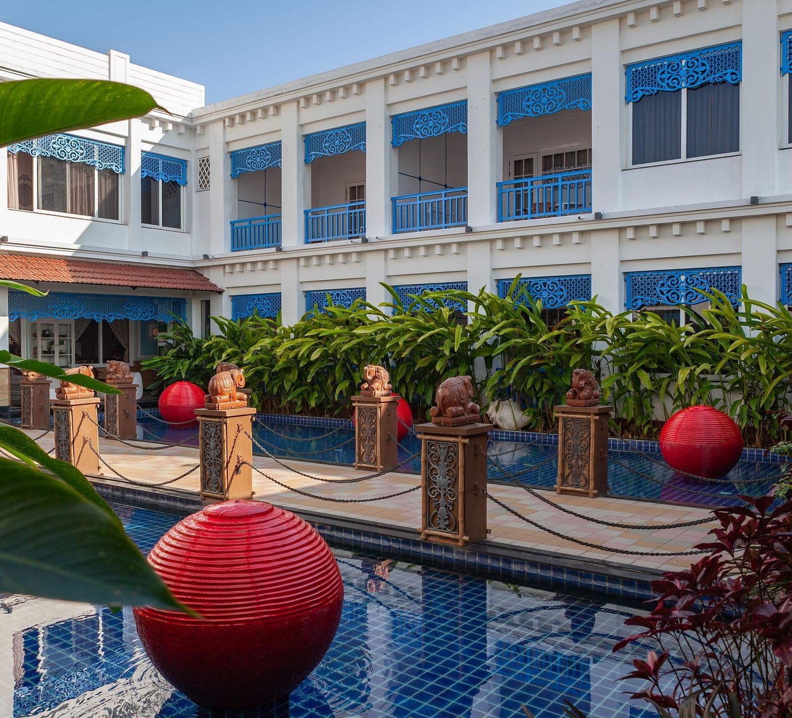 the exterior facade of the resort and the swimming pool - Mayfair Palm Beach Resort, Gopalpur-on-Sea