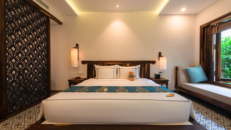 An image of a king size bed  - Alibu Resort Nha Thrang