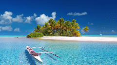 a canoe sailing towards an island with brown sand and blue sky in the background
