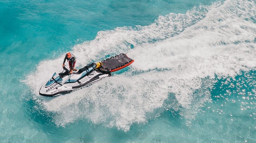 A person jetskiing in the sea