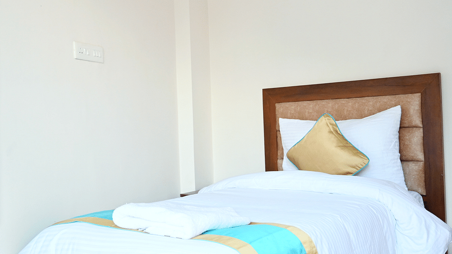 Interiors of the triple bed rooms in our hotel in Badrinath - Panchvati Inn Badrinath