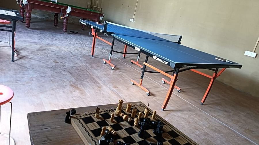 An indoor gaming area with a chessboard placed next to table tennis at White Sands Resort, Ladakh.