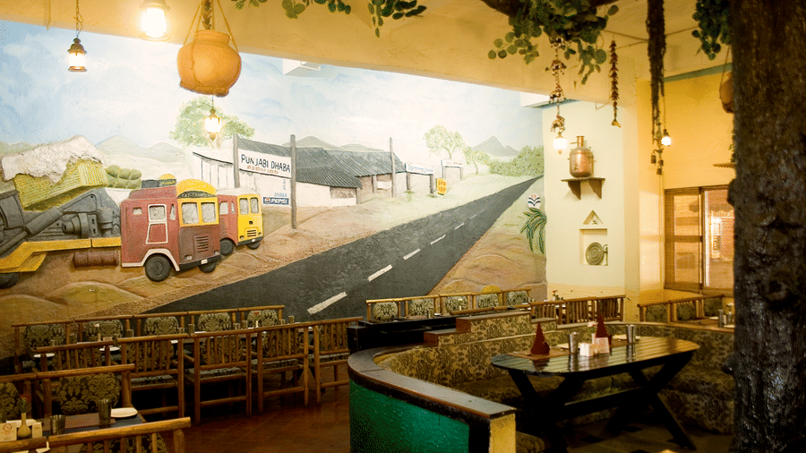 Ramanashree California Resort - view of the Dhaba 1995-style restaurant with indoor seating options