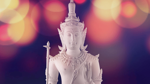 a white statue of lord vishnu