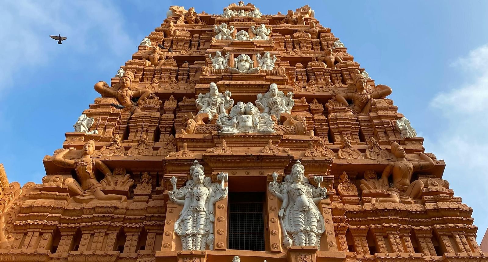 An image of a temple structure with a clear sky in the background