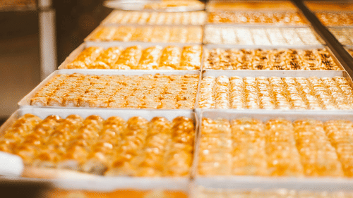Assorted sweets placed in a counter.