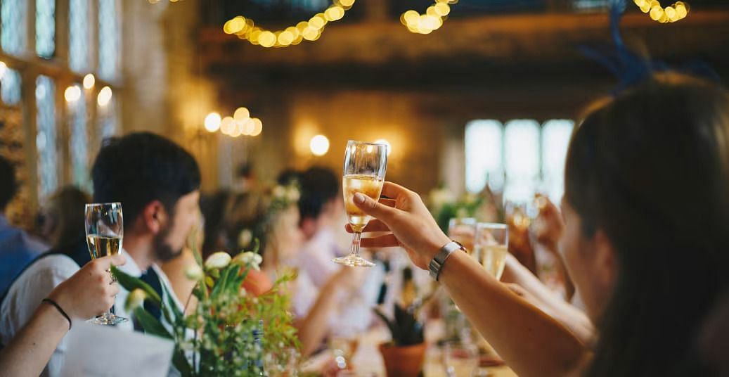 People raising a toast at an event