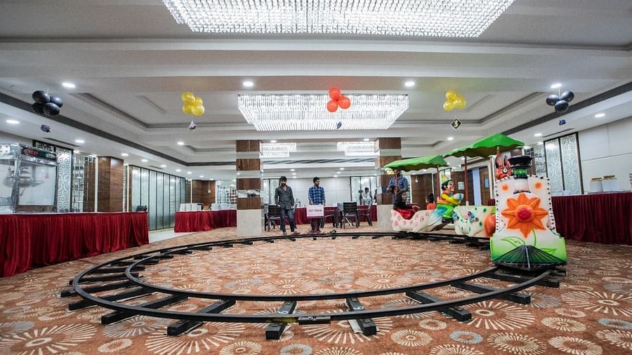 Event hall at Rang Lords Inn with a circular track and decorations, set for a themed party or event