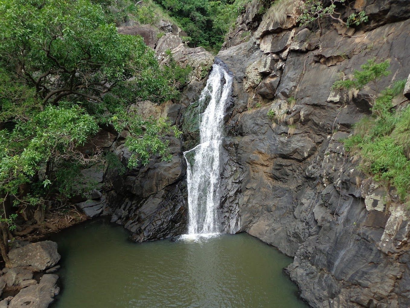 Shot of Koraiyaru Falls cascading down the rocks