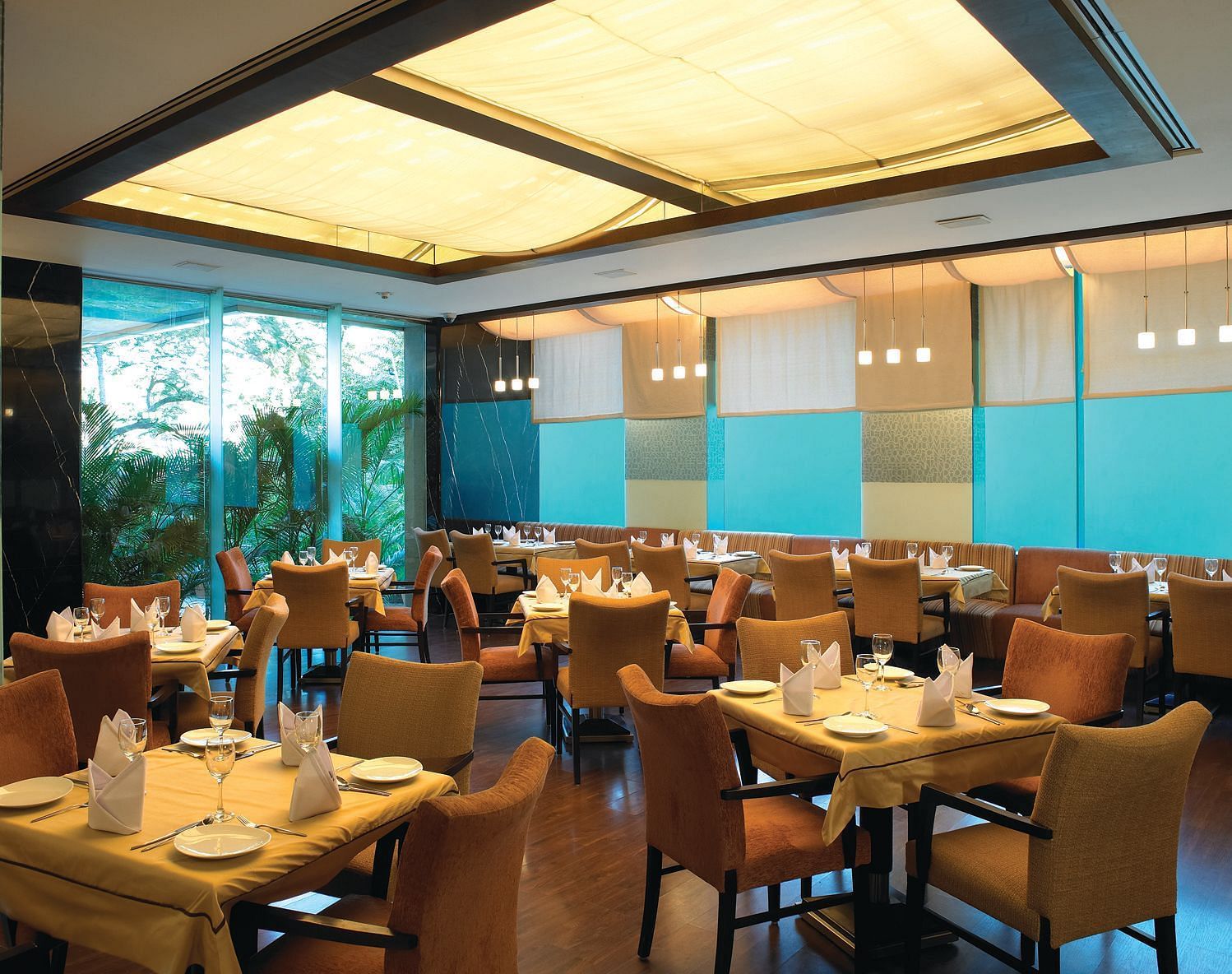 Shot of magnolia, our multi-cuisine restaurant with several seating arrangements | Mirage Hotel