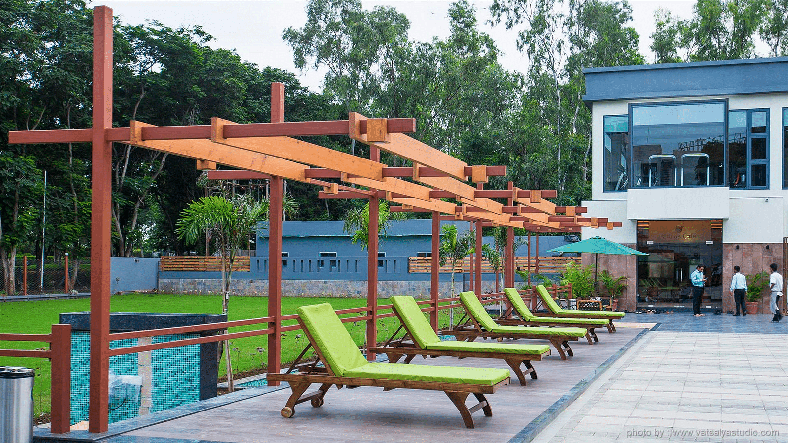 An image of lounger beds and a sun roof above them - Kamats India