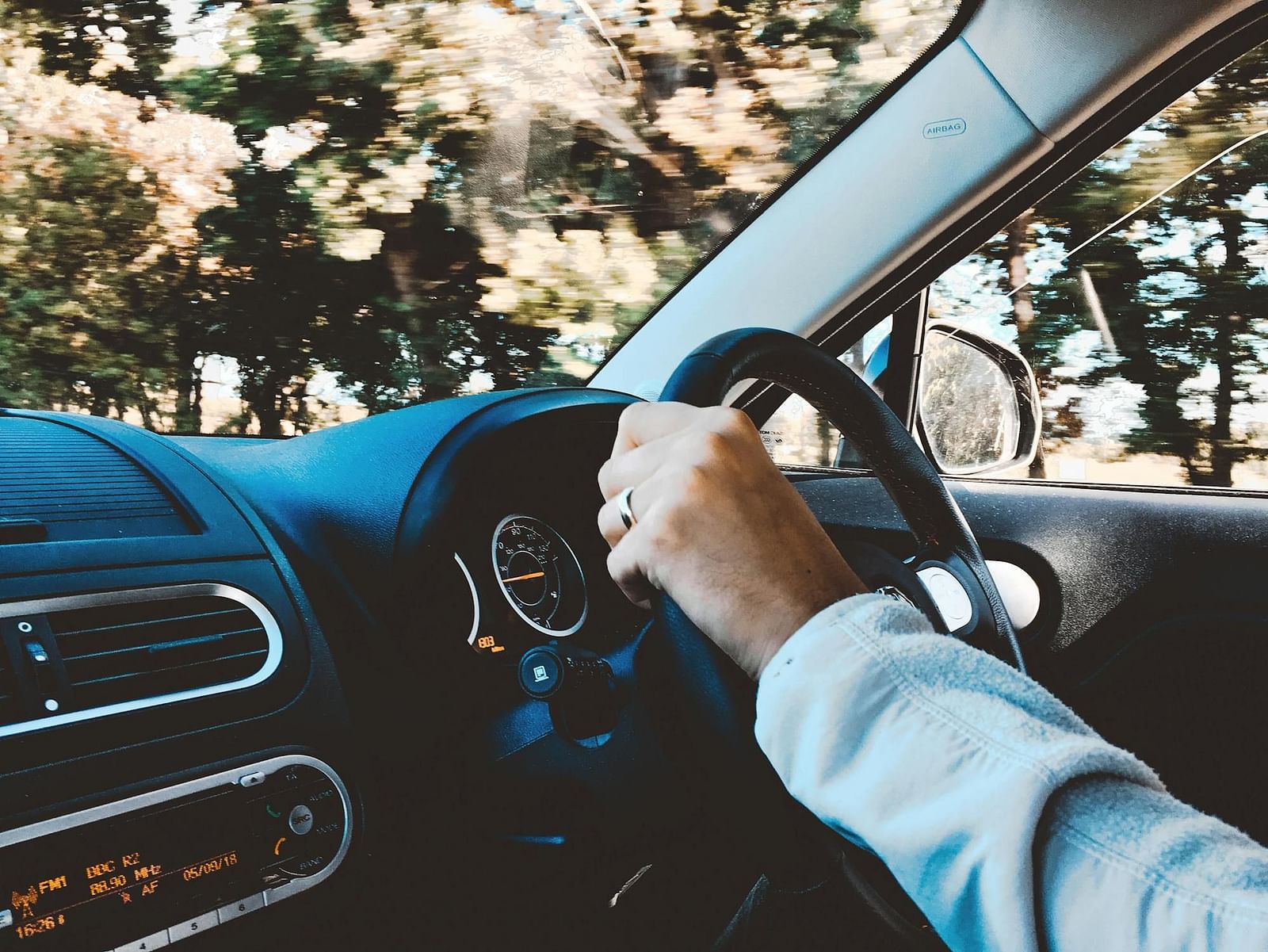 Person driving a car