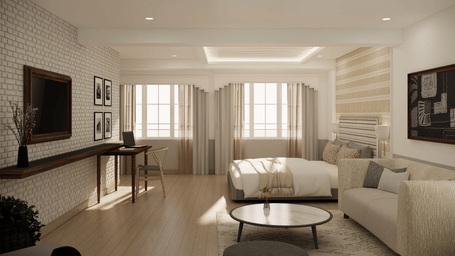 A suite with a king size bed, a desk area with a laptop, a seating area, and windows with curtains at Shilton Suites, Bengaluru.