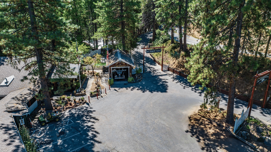 Aerial view of the cabins at Narrow Gauge Inn during a sunny day.