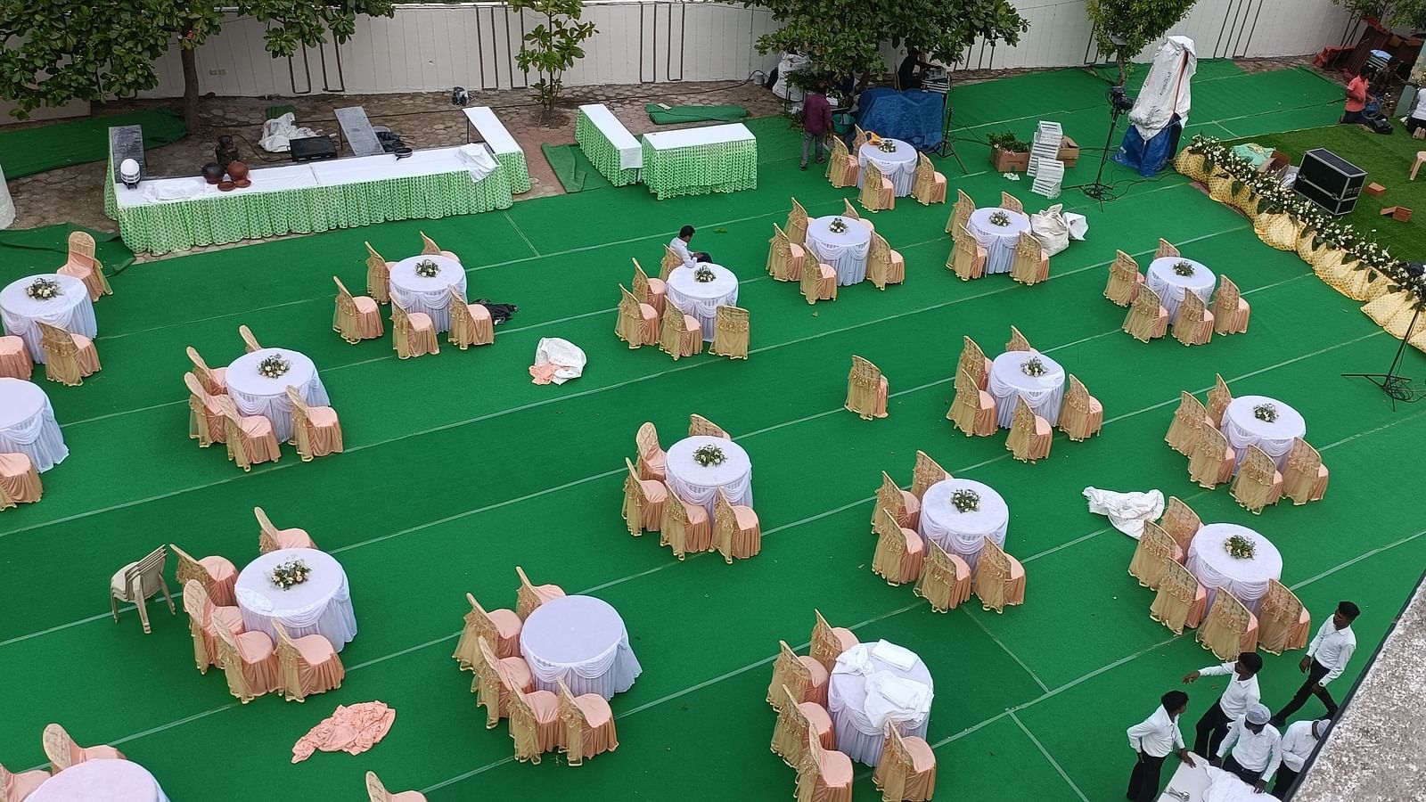 An aerial shot of our Starlight Garden venue in Tuticorin, featuring round tables with chairs placed around them - Regency Tuticorin by GRT Hotels