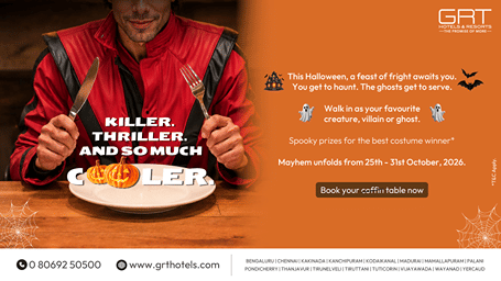 Halloween feast at GRT Hotels & Resorts featuring a costumed guest with spooky decorations and a Halloween themed dining setting