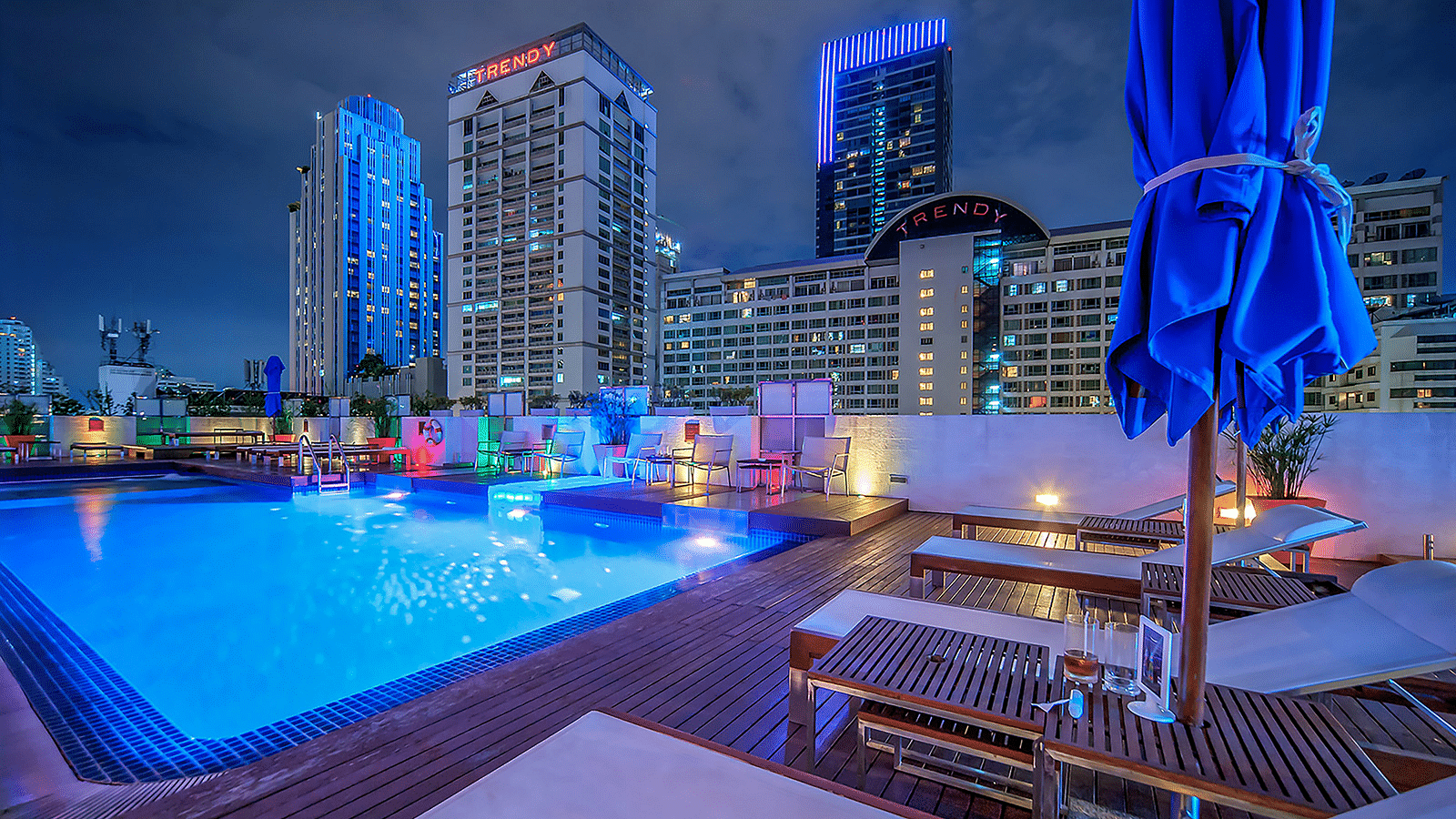 Rooftop swimming pool area at night - Night Hotel Bangkok