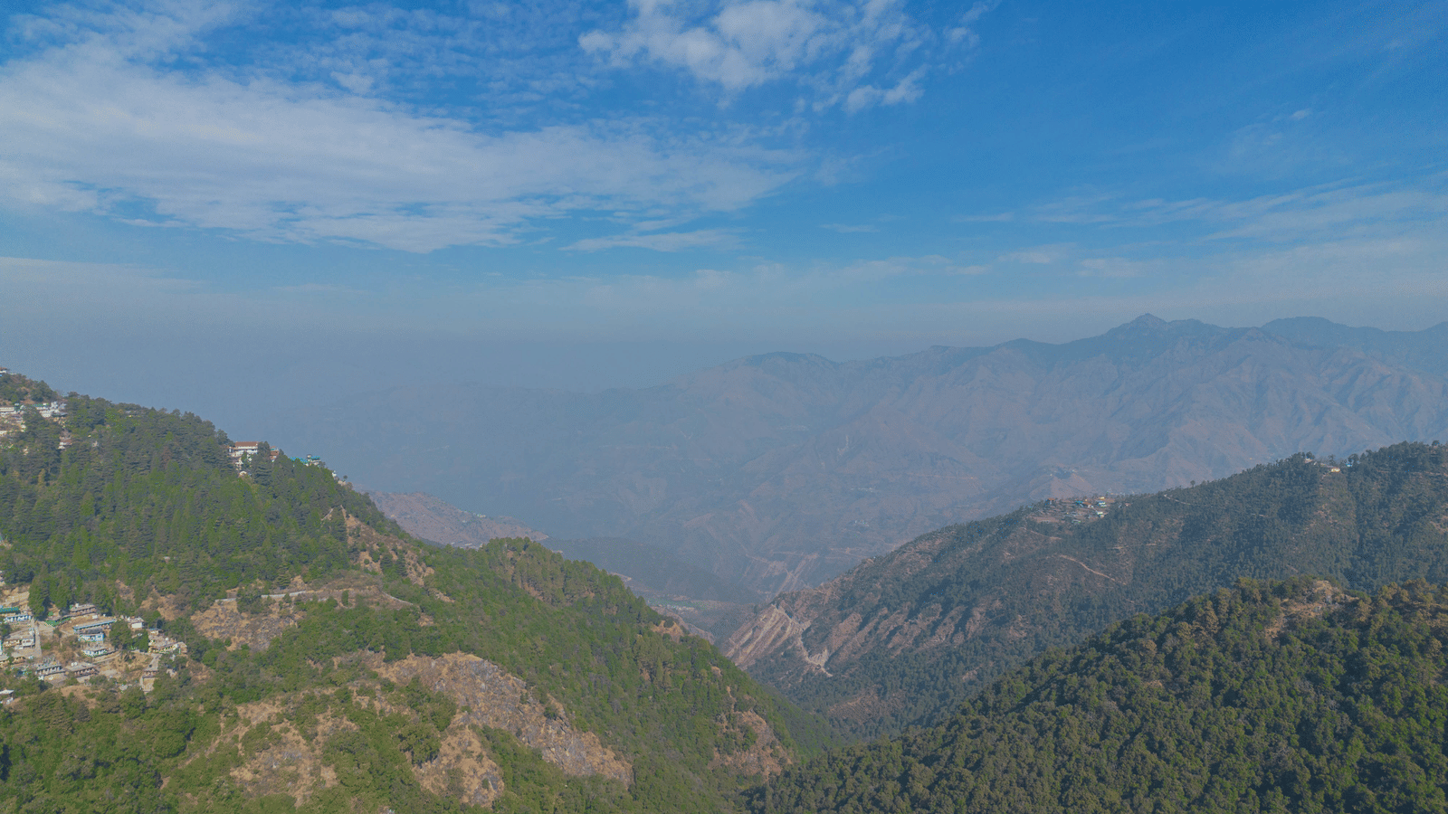 Mountain and valley landscape view from the hotel at Perfectstayz Premium at Mall Road Hotel Super, Mussoorie.