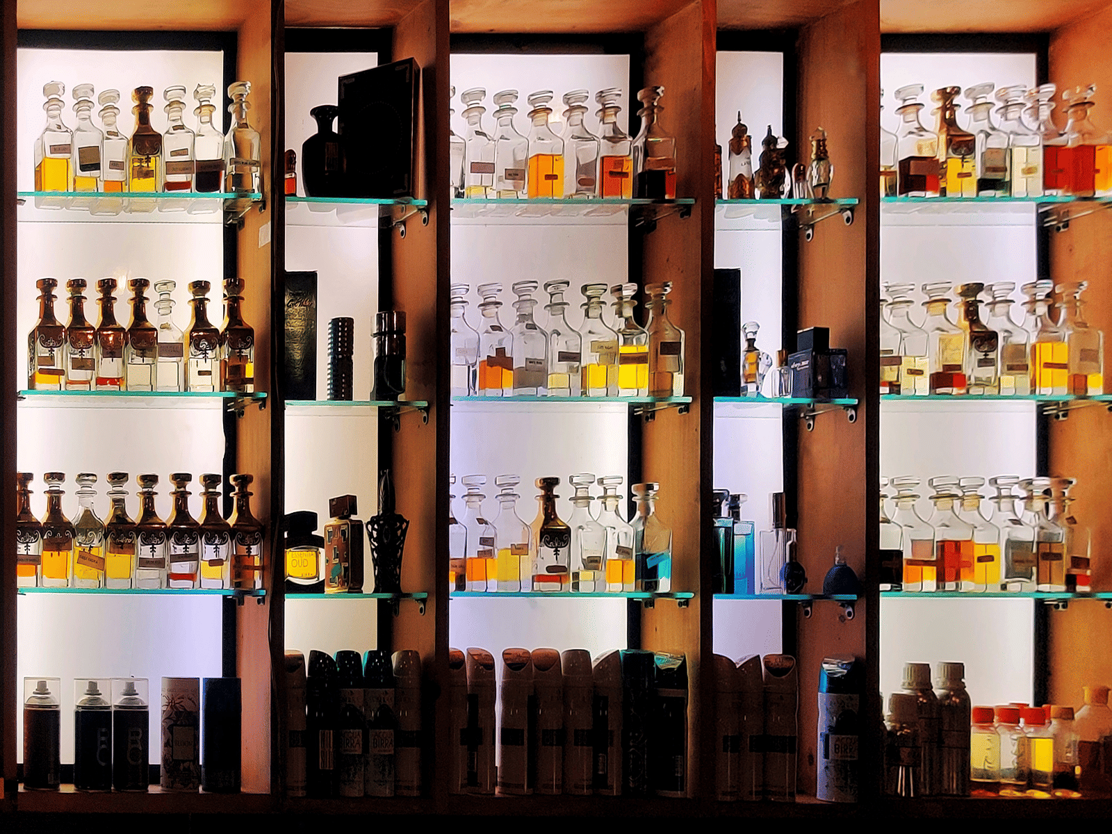 various perfume decanters and cans in a store