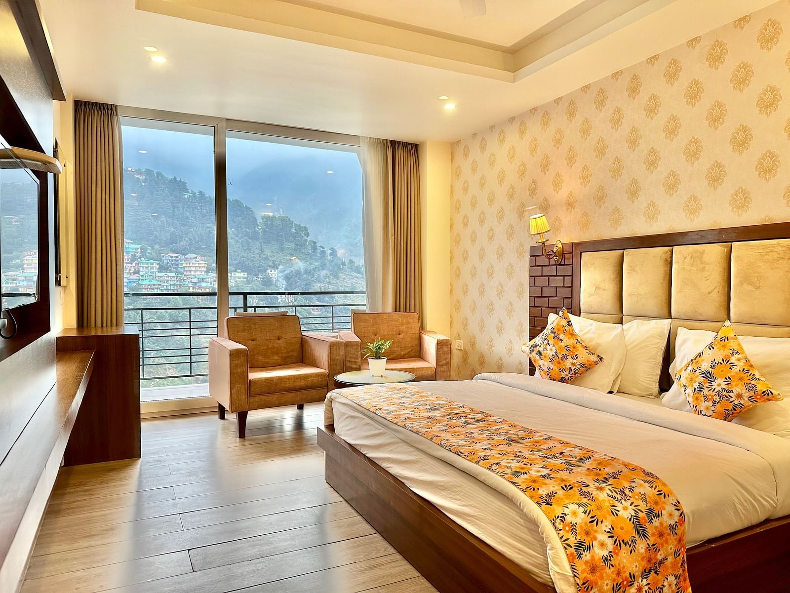 image of the premium room with balcony highlighting a beautiful mountain views from the huge windows - ZENQ SIGNATURE INN, MCLEODGANJ