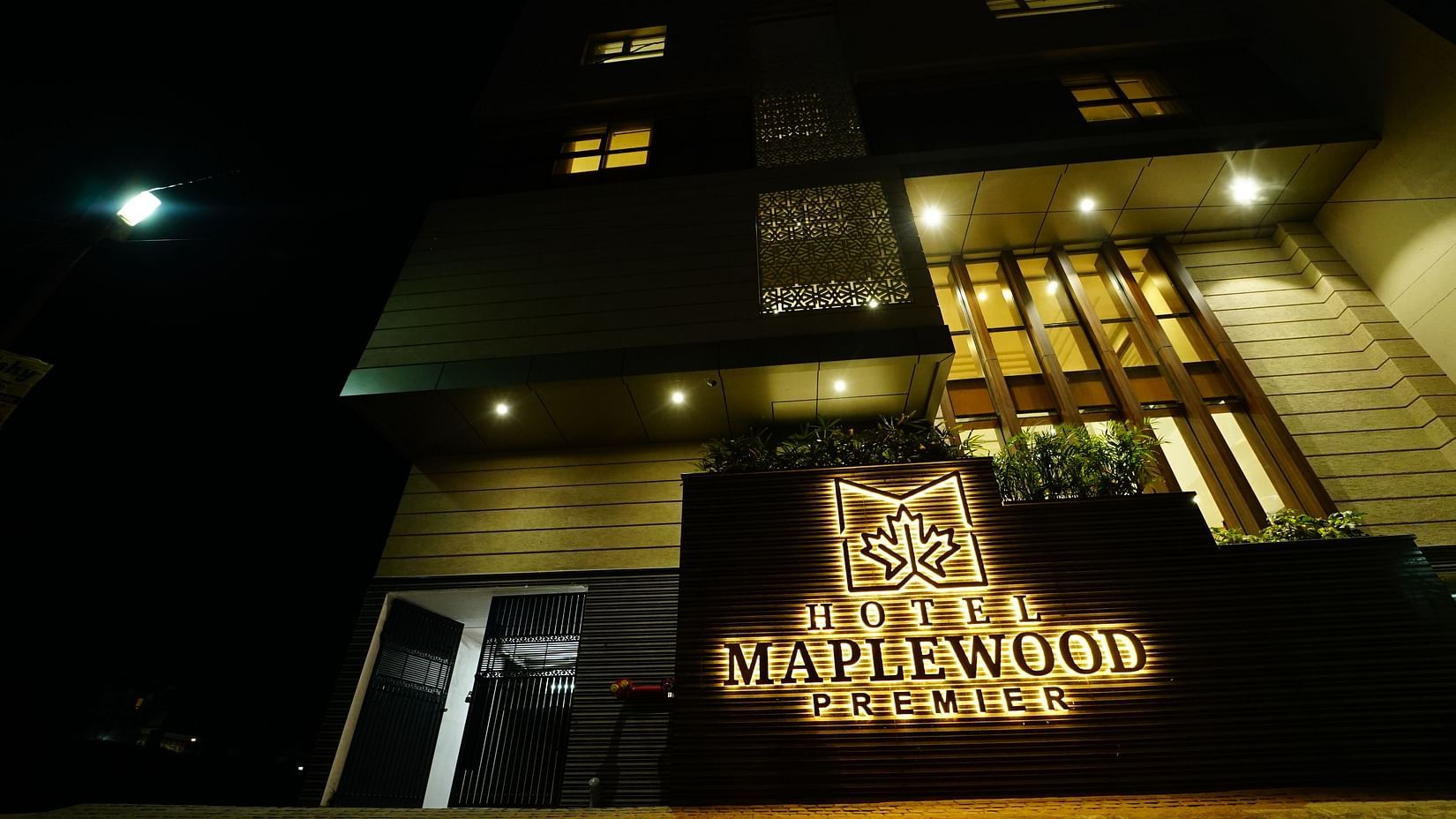 Facade of Five Elements Hotels Maplewood Premier at night