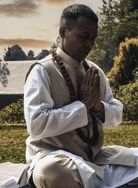 A picture of a religious man praying | Kavya Resort and Spa, Nagarkot