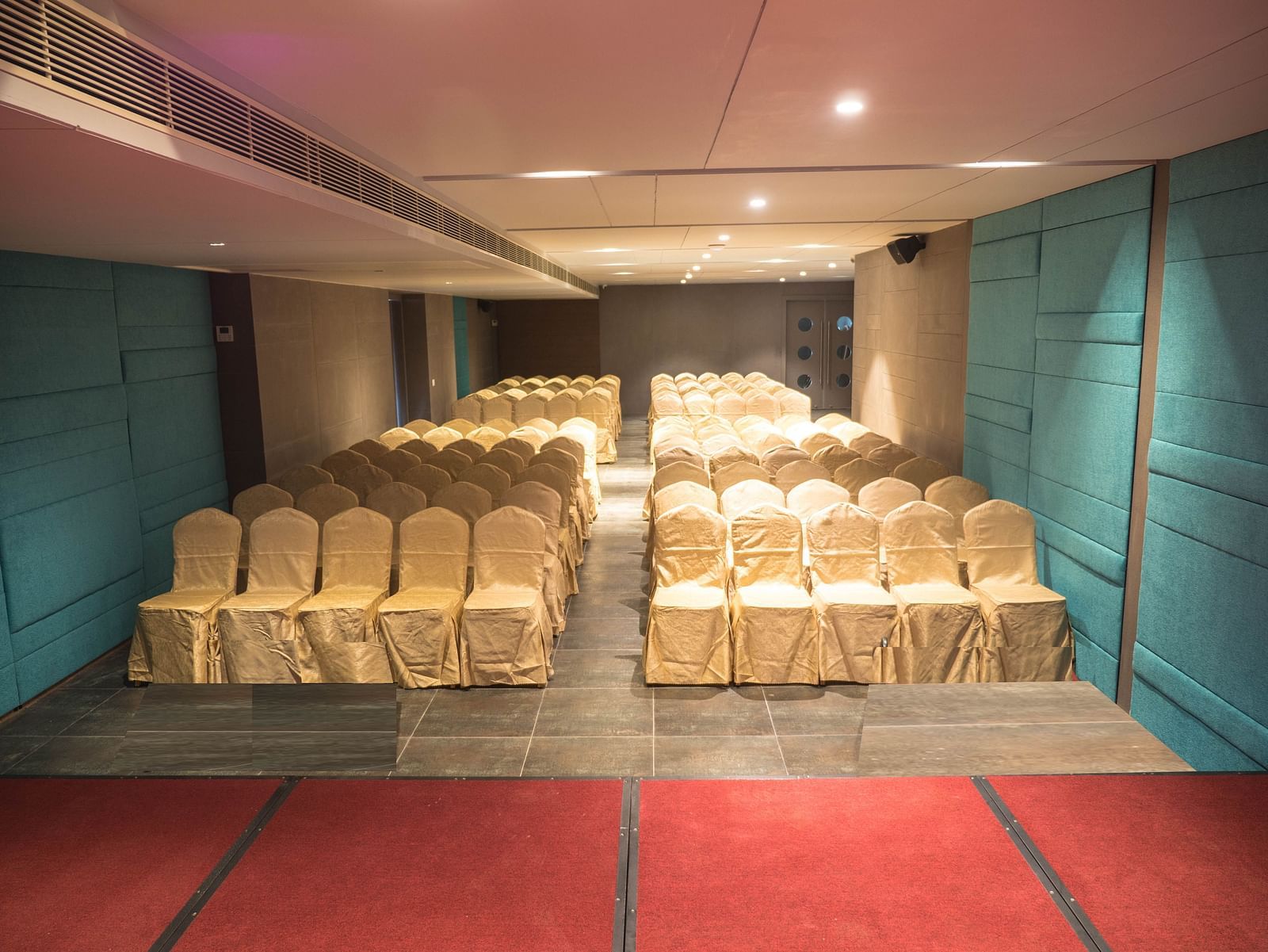 event halls white chairs at Cholaa Dynasty, Kumbakonam