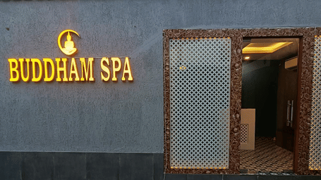 External entrance sign of Buddham Spa, a premium wellness center in Gurgaon.