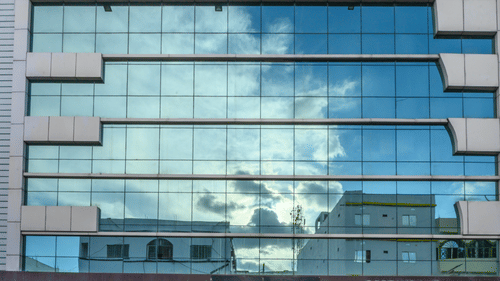 Hotel facade featuring a glass-covered building at Biznotel by Pride, Deoghar.