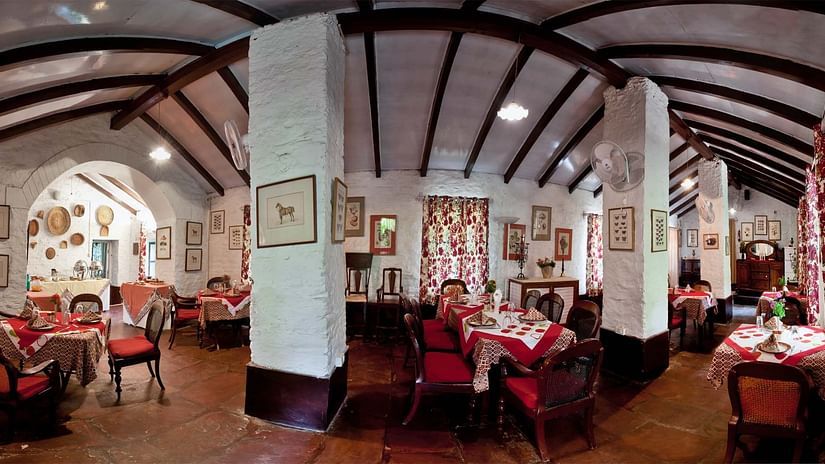 Seating arrangements inside the Restaurant - Ramgarh Bungalows, Nainital.