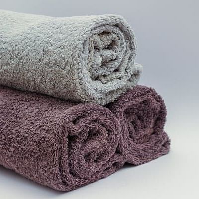 Images of three towels neatly arranged.