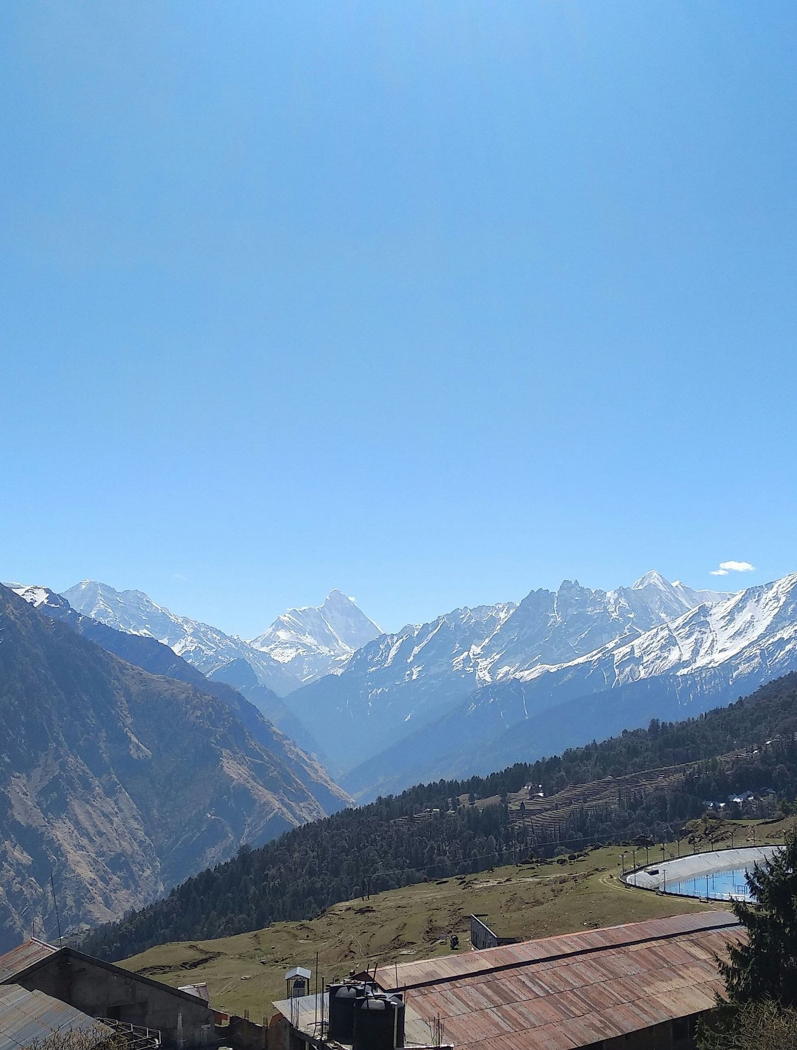 image showcasing splendid views of the himalayas with a clear blue sky in the background