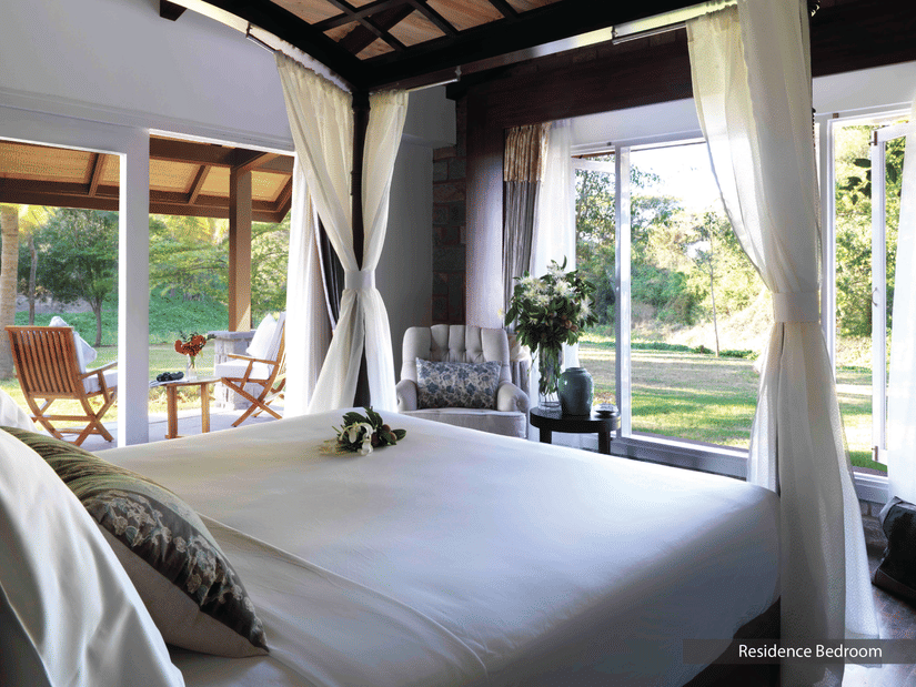 a double bed in The residence room at The Serai - 18