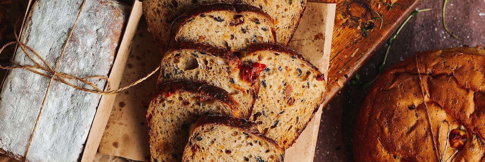 Freshly baked bread on a board.