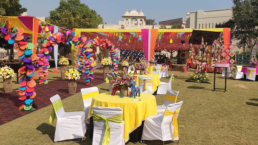 The lavish lawn at Pride Hotels, beautifully decorated for a vibrant and colourful event, exudes elegance and charm.