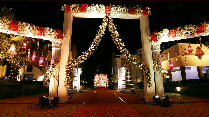 The decorated archway that leads to the event venue - Wedlock Greens Resort