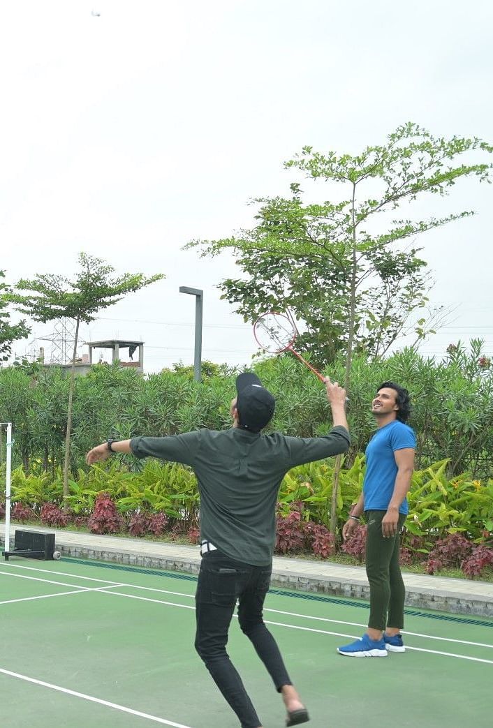 People playing badminton at Singalila Club
