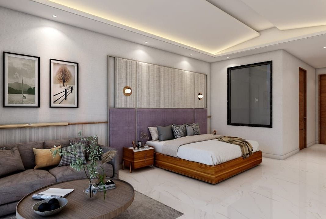 A spacious room featuring a double bed alongside a common seating area. - Namaste Corbett