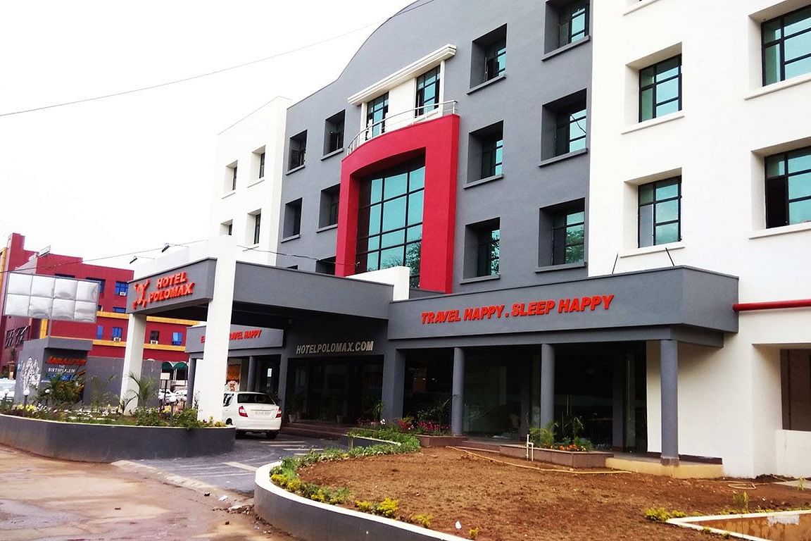 facade image of our hotel in Jabalpur taken on a bright cloudy day - Max Hotel, Jabalpur