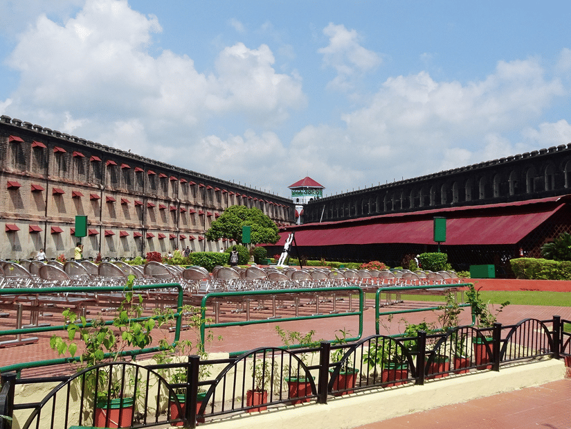 An overview of the exterior facade of the Cellular Jail, one of the must-visit Andaman and Nicobar Islands tourist destinations, with blue sky in the background