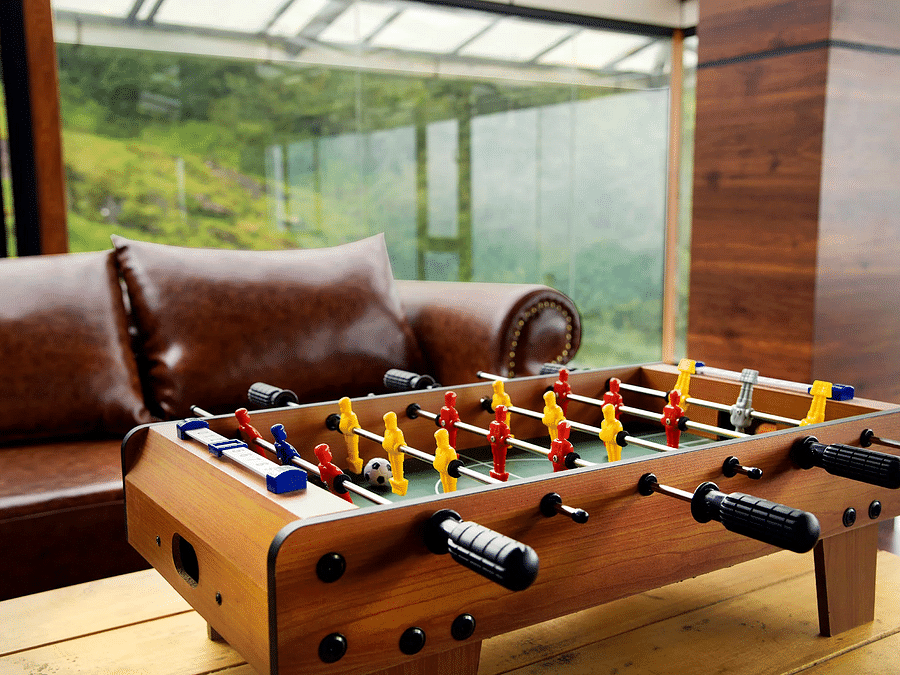 Shot of a Foosball table at the game zone of the villa | Ibex Stays and Trails, Valparai (Tale Rock)