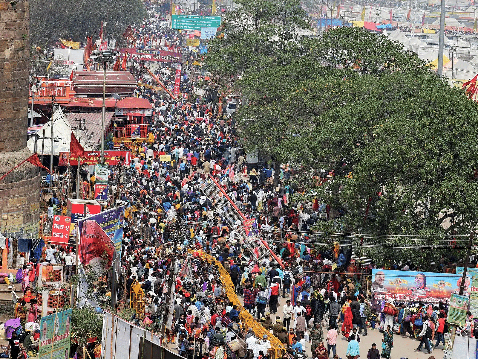 A large crowd gathered at a bustling temple fair or religious procession.