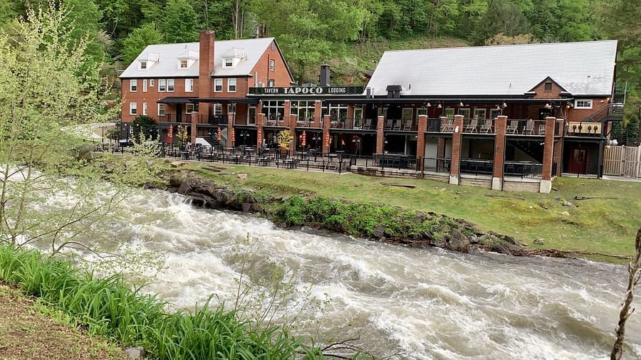 facade image of our resort in North Carolina taken from the opposite of the river - Historic Tapoco Lodge